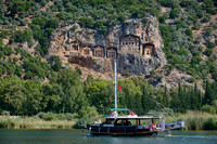 Tourist ship in front of Lycian rock tombs