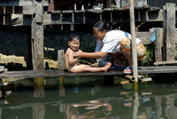 locals washing themself in the lake