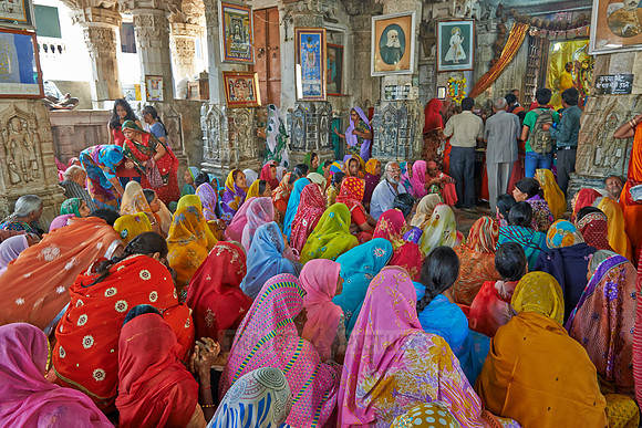 colorful hindu women during ceremony