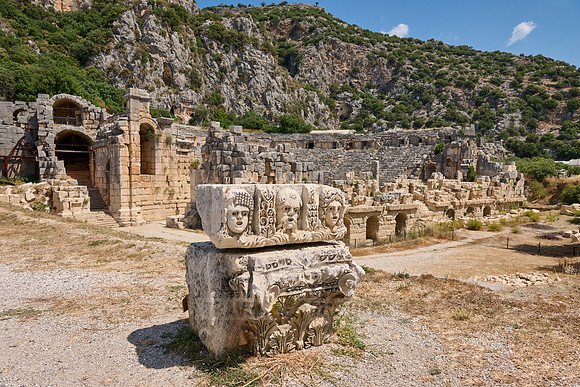 carved stone faces in front of Roman theatre in Myra